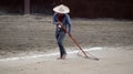 Mexican horsemen sweeping sand