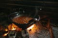 Mexican indigenous woman preparing Mole on a clay pot Royalty Free Stock Photo