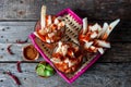 Mexican jicama fruit cutted with lime, chili powder and chamoy Royalty Free Stock Photo