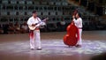 Mexican musicians playing guitar and double bass