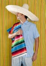 Mexican man serape poncho hat sombrero Royalty Free Stock Photo