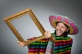 The mexican man with sombrero and picture frame Royalty Free Stock Photo