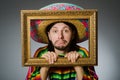 The mexican man with sombrero and picture frame Royalty Free Stock Photo