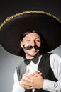 Mexican man wears sombrero isolated on the white Royalty Free Stock Photo