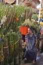 Mexican market, Cholula, woman with flowers to sale