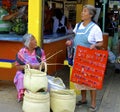 Mexican market seller chatting