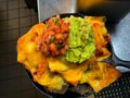 Mexican nachos tortilla chips with guacamole ,salsa and cheese - image Royalty Free Stock Photo