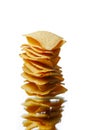 Mexican nachos tortilla chips stack, isolated on white Royalty Free Stock Photo