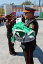 Mexican officers folding flag ceremony