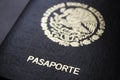 Mexican passport in a black background