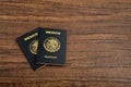 Mexican passports on wooden table. Royalty Free Stock Photo
