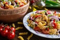 Mexican pasta salad with red bean, corn, tomato, onion and pepper