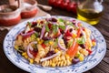 Mexican pasta salad with red bean, corn, tomato, onion and pepper Royalty Free Stock Photo