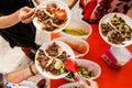 Mexican People eating tacos al pastor in Taqueria in Mexico