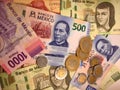 Mexican peso bills spread randomly over a flat surface Royalty Free Stock Photo