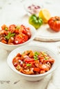 Mexican Pico de Gallo with ingredients - tomato salad with onion, parsley, coriander