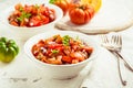 Mexican Pico de Gallo with ingredients - tomato salad with onion, parsley, coriander