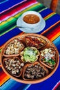 Mexican plate with different meat and guacamole Royalty Free Stock Photo