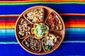 Mexican plate with different meat and guacamole Royalty Free Stock Photo