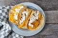 Mexican potato stew tacos with fresh cheese