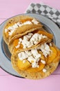 Mexican potato stew tacos with fresh cheese