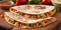 Mexican quesadilla with chicken, cheese, and peppers on wooden table