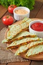 Mexican Quesadilla sliced with vegetables Royalty Free Stock Photo