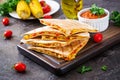 Quesadilla wrap with chicken, corn and sweet pepper and tomato sauce Royalty Free Stock Photo