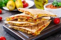 Quesadilla wrap with chicken, corn and sweet pepper and tomato sauce Royalty Free Stock Photo