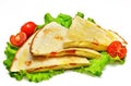 Mexican quesadillas with cheese, vegetables and salsa isolated