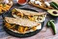 Mexican quesadillas with squash blossom, epazote leaves, oaxaca cheese or quesillo and chicharrÃÂ³n traditional dish from the city