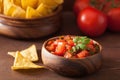 Mexican salsa dip and nachos tortilla chips