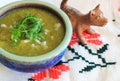 Mexican Salsa Verde and clay Xoloitzcuintle dog