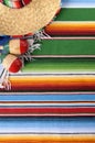 Mexican background sombrero blanket copy space vertical Royalty Free Stock Photo