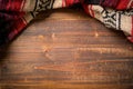 Mexican Serape blanket on wood Background Royalty Free Stock Photo