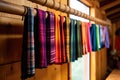 mexican serapes hanging on a wooden rack Royalty Free Stock Photo