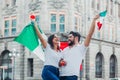 Mexican soccer fans holding flags and trumpets to celebrate in Mexico City Royalty Free Stock Photo