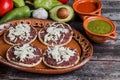 Mexican sopes with grated cheese and fried beans, Traditional breakfast in Mexico