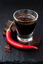 Mexican spicy hot chocolate with chili pepper and cinnamon Royalty Free Stock Photo