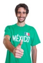 Mexican sports fan with beard showing thumb up Royalty Free Stock Photo