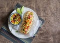 Mexican street style hot dog on wooden background Royalty Free Stock Photo