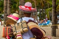 Mexican street vendor selling straw handbags and hats on the waterfront, Malecon, in Puerto Vallarta, Mexico, 2020 Royalty Free Stock Photo