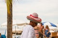 Mexican street vendor selling straw handbags and hats on the waterfront, Malecon, in Puerto Vallarta, Mexico, 2020 Royalty Free Stock Photo