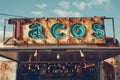 A mexican taco illuminated sign above a street food vendor truck. Royalty Free Stock Photo