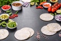 Mexican tacos with beef, tomatoes, avocado, onion and salsa sauce Royalty Free Stock Photo