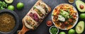 Mexican tacos and carne asada fries in panoramic wide composition Royalty Free Stock Photo