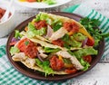 Mexican tacos with chicken, black beans and fresh vegetables Royalty Free Stock Photo