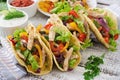 Mexican tacos with chicken, black beans and fresh vegetables Royalty Free Stock Photo