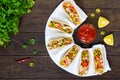 Mexican tacos with meat, corn, tomatoes, sweet pepper, red onions in a wheat tortilla Royalty Free Stock Photo