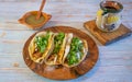 Mexican tacos with pancita, green sauce and mexican coffee Royalty Free Stock Photo